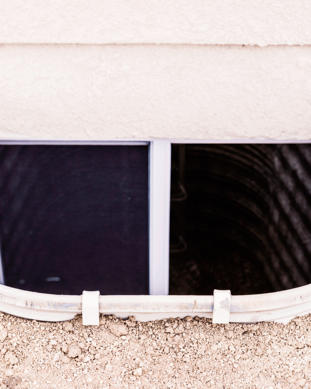 Window well maintenance for summer protection at a Colorado home