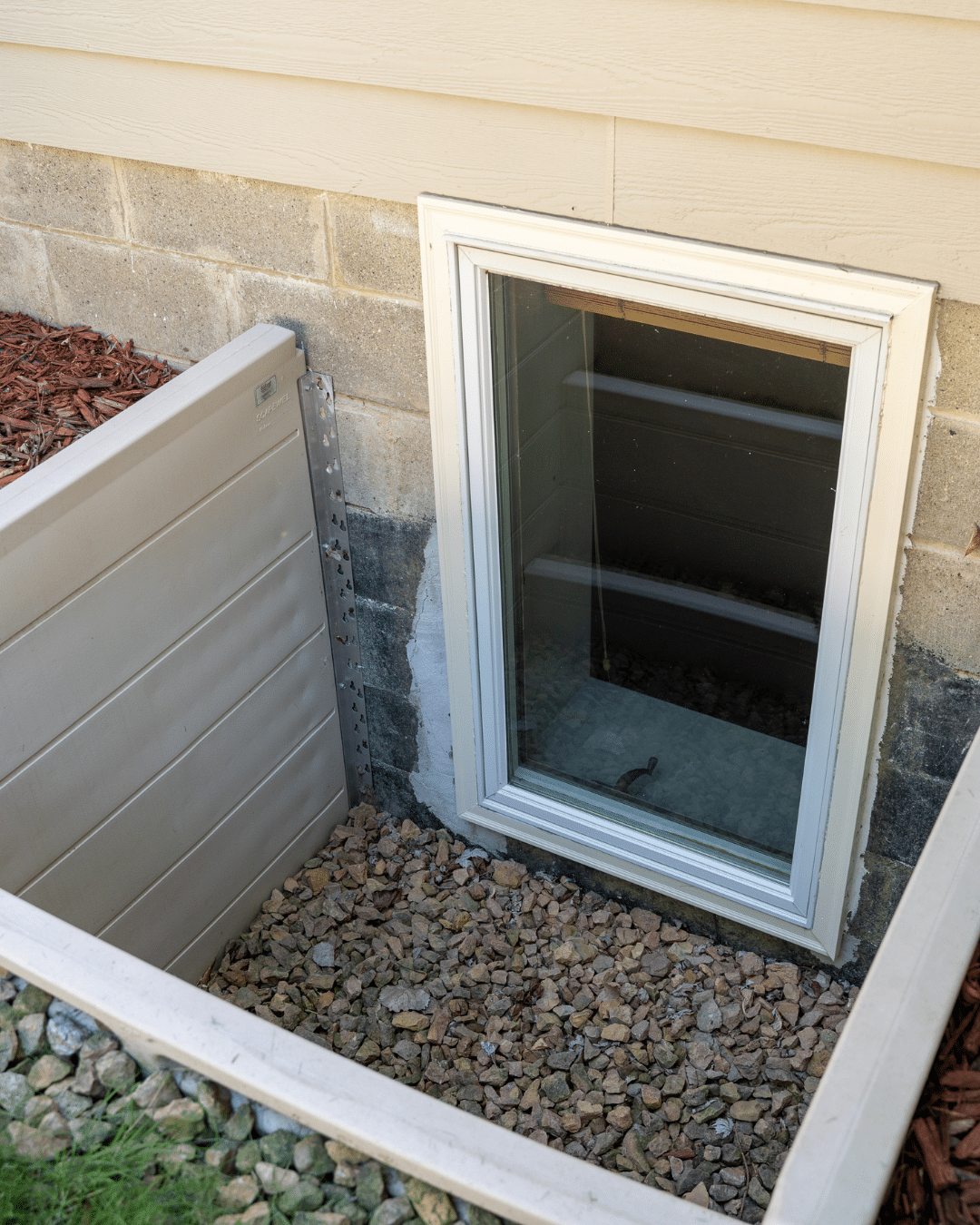 Damaged window well needing replacement before winter in Fort Collins, Colorado